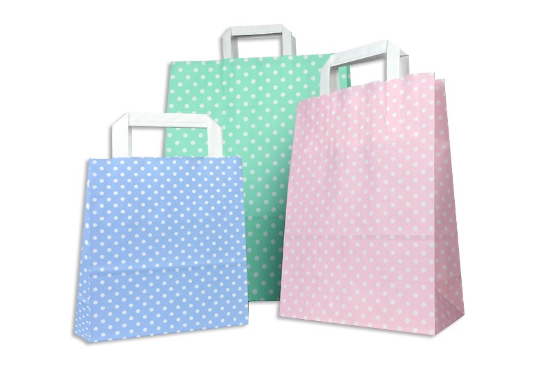 Papiertaschen farbig in Pastelltönen blau, grün und rosas bedruckt mit weißen Punkten und Flachhenkeln