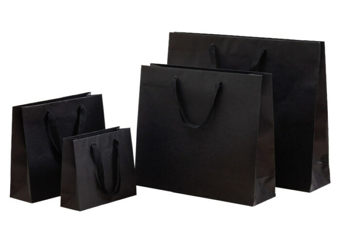 tausendtypentragetaschen - Papiertasche Exclusiva schwarz mit Band - im Onlineshop