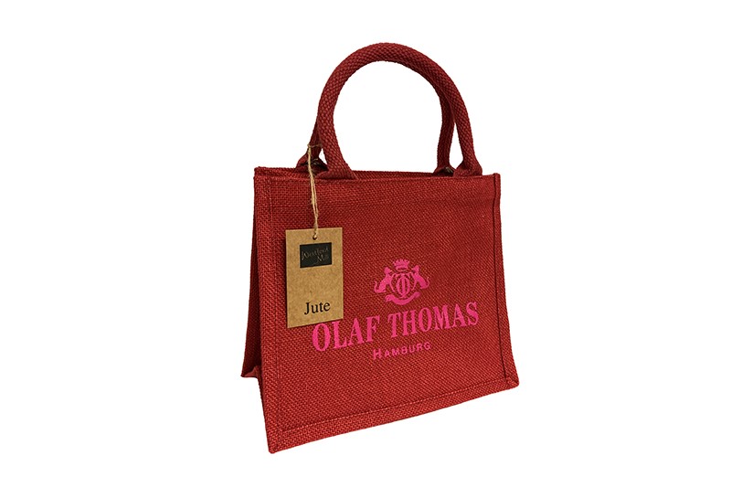 kleine, rote Jute-Taschen mit pinkfarbigem Werbeaufdruck Olaf Thomas Interieurs bei Tausendtypentragetaschen.de