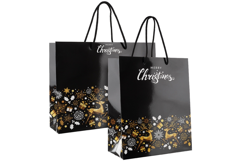 tausendtypentragetaschen - Papiertasche als Geschenktasche mit Weihnachtsmotiv MerryChristmas Goldener Hirsch bei tausendtypentragetaschen