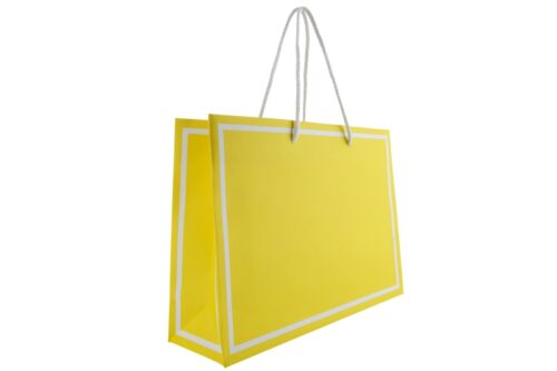 Gelbe Papiertasche Coty21 mit weißen Rahmen und Baumwollkordeln