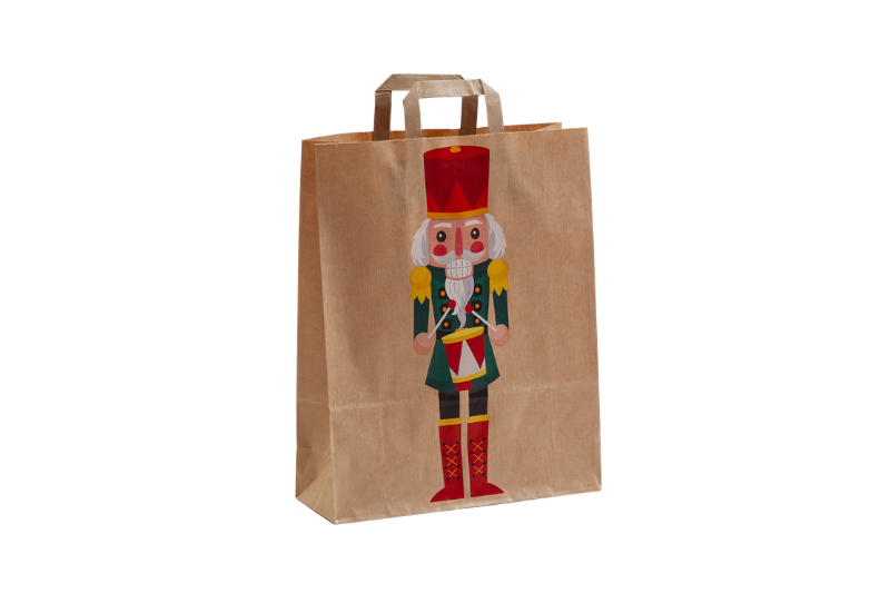 Weihnachtstasche Nussknacker aus Papier bedruckt mit einem bunten Nussknacker, Jackenfarbe grün, große Größe bei tausendtypentragetaaschen.de