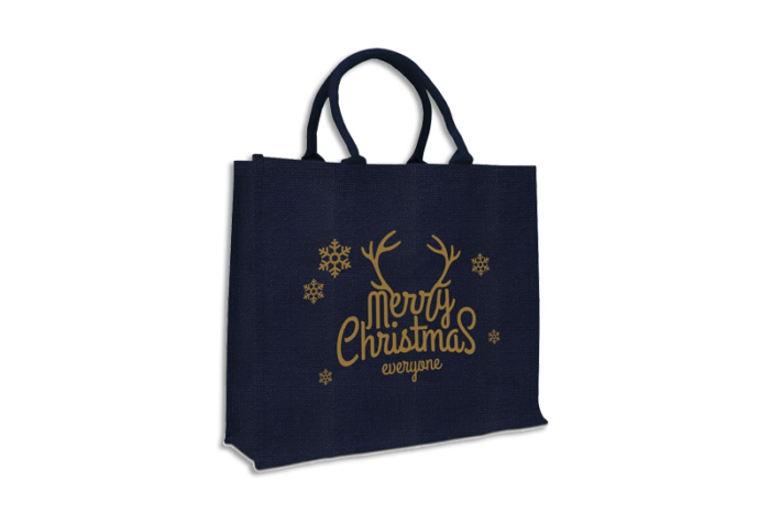 dunkelblaue Jute-Tasche mit Glitterfäden in gold, Aufdruck Merry Christmas in gold, kurze Baumwollhenkel bei tausendtypentragetaschen