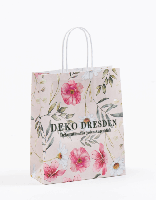 Papiertasche mit filigranem Blützenzaubermotiv und Logodruck in schwarz DekoDresden bei tausendtypentragetaschen
