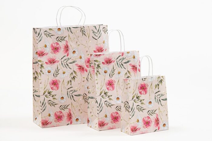 Papiertasche in 3 Größen mit floralem Aquarellmotiv, zarte Farben von rose bis grün, weiße Papierkordeln bei tausendtypentragetaschen