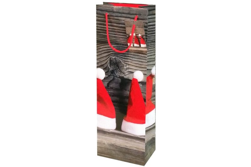 Flaschentasche Weihnachtsmützen mit glänzendem Motiv: rote Weihnachtsmützen auf dunklem Holzhintergrund, an den roten Kordeln ist ein Anhängeetikett im gleichen Look befestigt. Jetzt bei Tausendtypentragetaschen.de