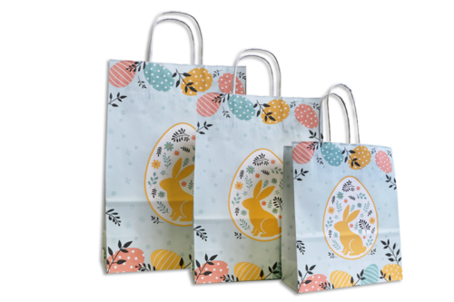 Papiertragetaschen mit Ostermotiv Frohe Ostern in hellen pastellblau, orange, grün, rosa und gelb mit Osterhasen, Eiern und Zweigen in 3 Größen im Shop von tausendtypentragetaschen
